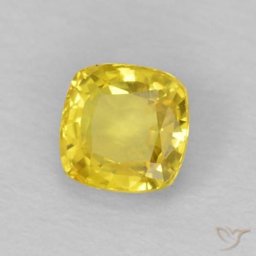 Zafiro Dorado amarillento natural de 0.62 ct, Forma Cojín, VS