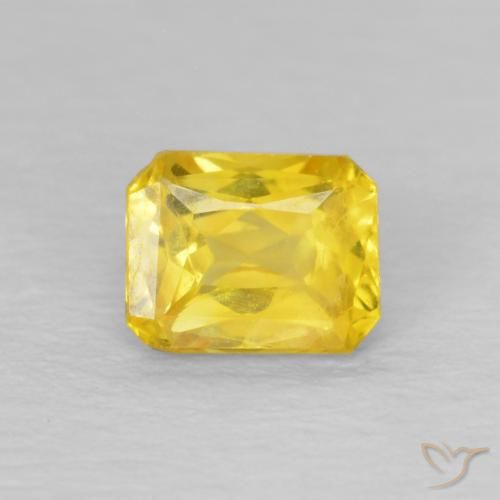 0.56ct Natural Amarillo medio Zafiro, corte esmeralda, VS