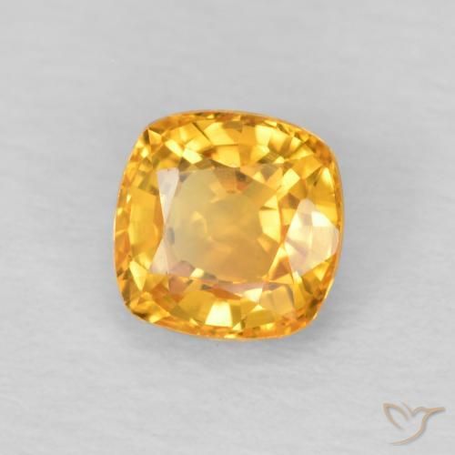 Zafiro Dorado naranja natural de 0.57 ct, Forma Cojín, VVS