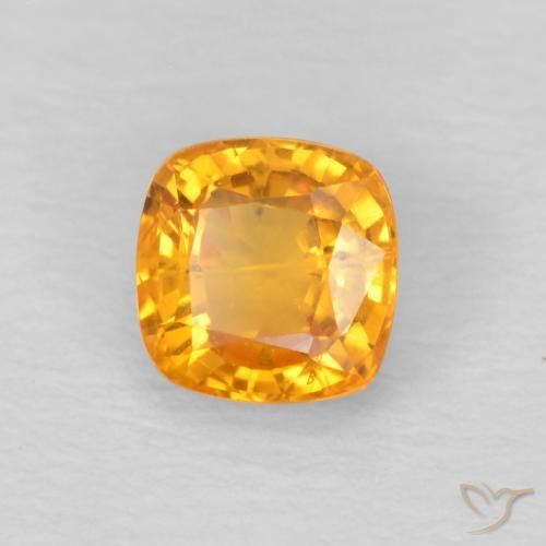 Zafiro Dorado naranja natural de 0.62 ct, Forma Cojín, VS