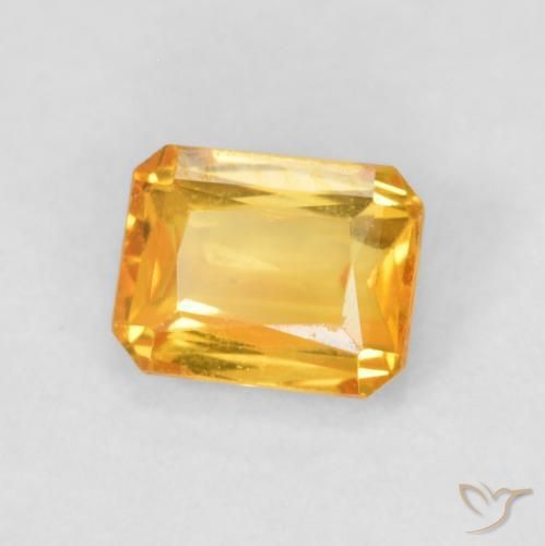 Zafiro Dorado naranja oscuro natural de 0.66 ct, Corte Octágono / Esmeralda, VS