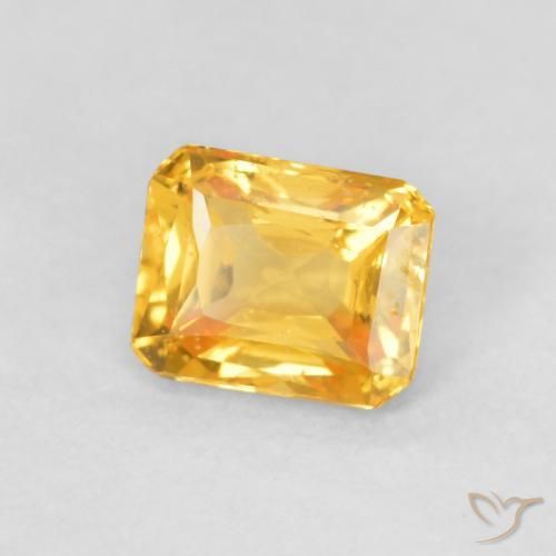 Zafiro Dorado naranja intenso natural de 0.53 ct, Corte Octágono / Esmeralda, VS