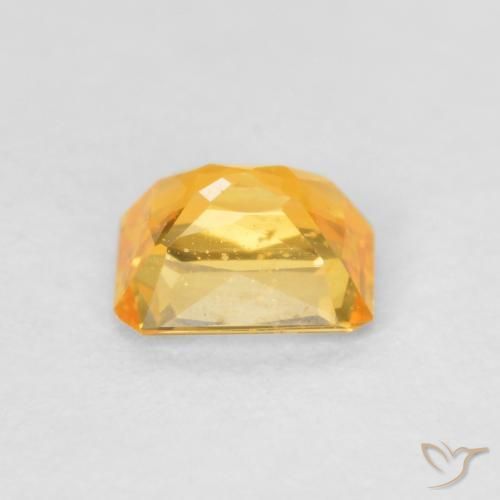 Zafiro Dorado naranja intenso natural de 0.53 ct, Corte Octágono / Esmeralda, VS