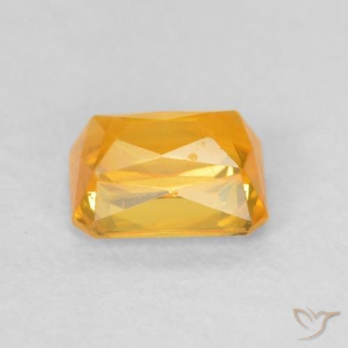 Zafiro Dorado naranja natural de 0.68 ct, Corte Octágono / Esmeralda, VS