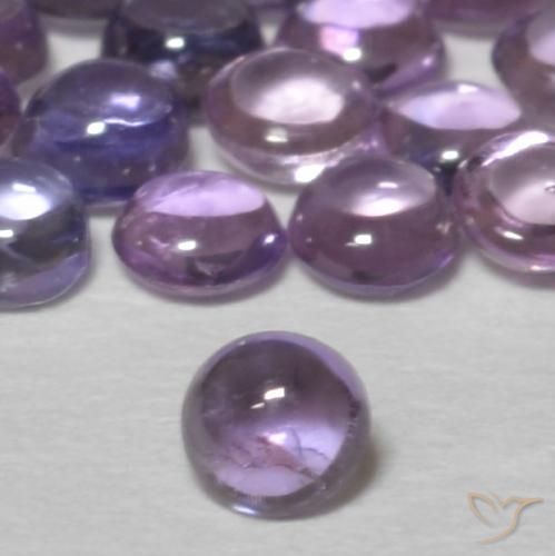 Zafiro Violeta medio natural de 0.11 ct, Redondo, Transparente