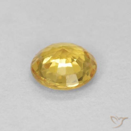 Zafiro Dorado medio natural de 0.39 ct, Redondo, VS