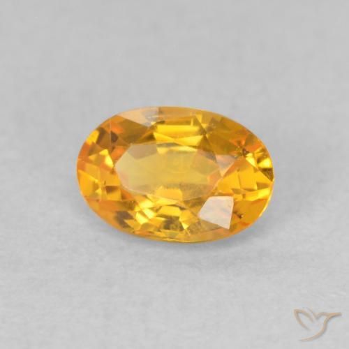 Zafiro Medium Light Orange-Gold natural de 0.62 ct, Ovalada, VVS-VS