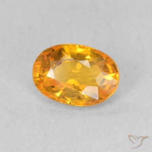 Zafiro Naranja medio natural de 0.67 ct, Ovalada, VVS-VS