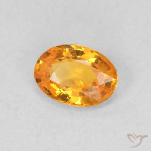 Zafiro Naranja medio natural de 0.53 ct, Ovalada, VVS-VS