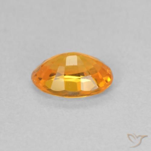 Zafiro Naranja albaricoque natural de 0.59 ct, Ovalada, VS