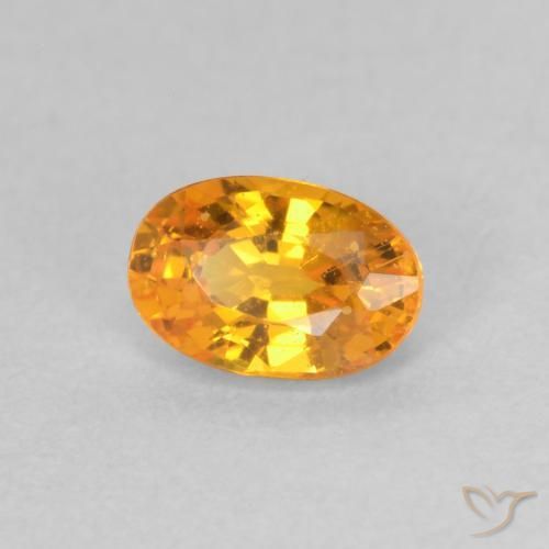 Zafiro Naranja albaricoque natural de 0.65 ct, Ovalada, VS