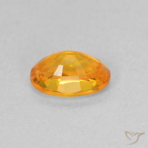 Zafiro Naranja albaricoque natural de 0.65 ct, Ovalada, VS