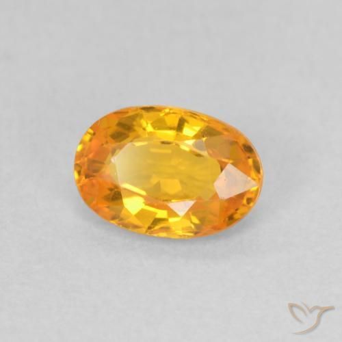 Zafiro Naranja claro natural de 0.63 ct, Ovalada, VS