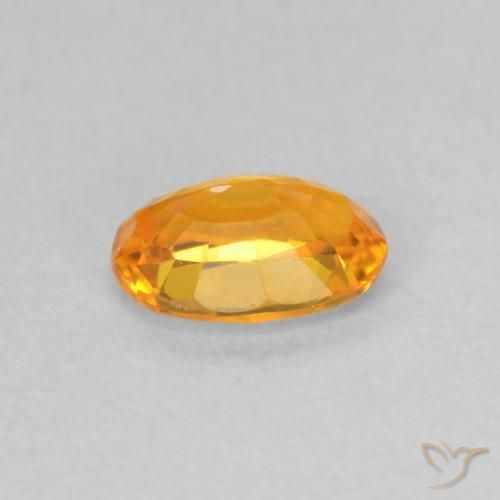 Zafiro Naranja claro natural de 0.63 ct, Ovalada, VS