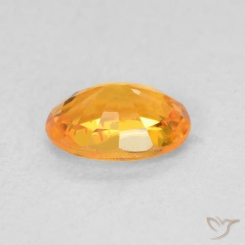 Zafiro Naranja claro natural de 0.68 ct, Ovalada, VS