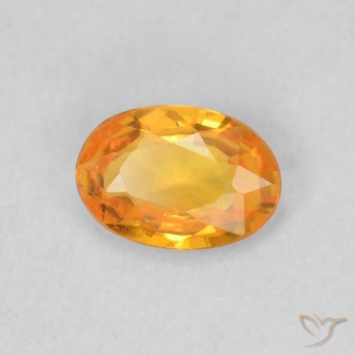 Zafiro Naranja claro natural de 0.53 ct, Ovalada, VS