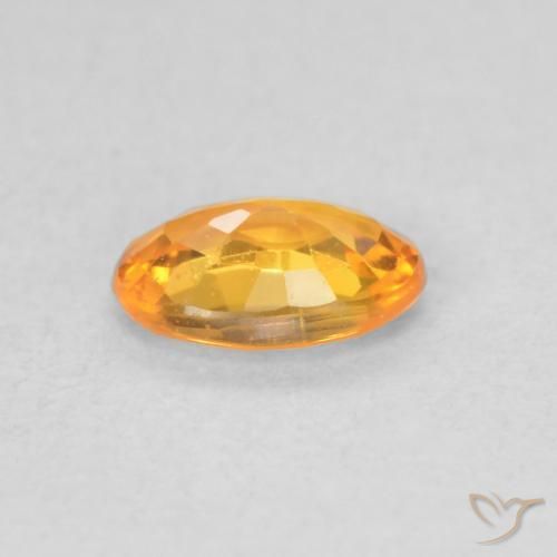 Zafiro Naranja claro natural de 0.53 ct, Ovalada, VS