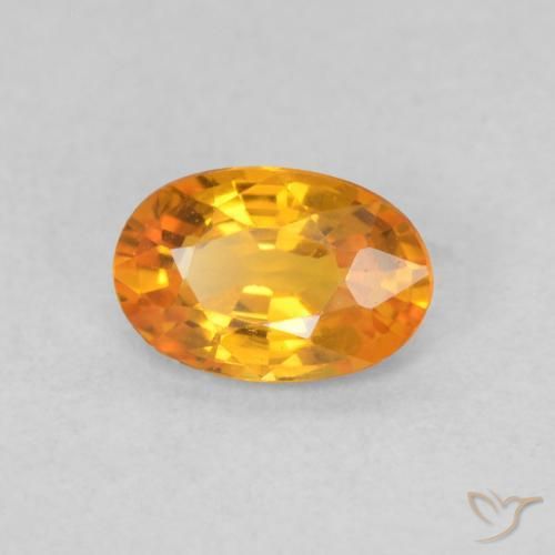 Zafiro Naranja claro natural de 0.55 ct, Ovalada, VS