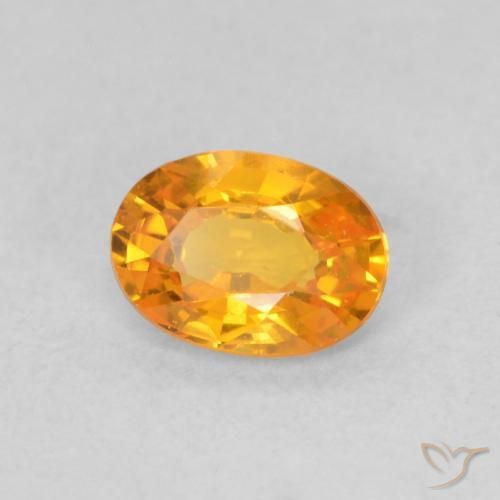 Zafiro Naranja claro natural de 0.59 ct, Ovalada, VS