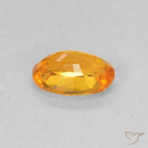 Zafiro Naranja claro natural de 0.59 ct, Ovalada, VS