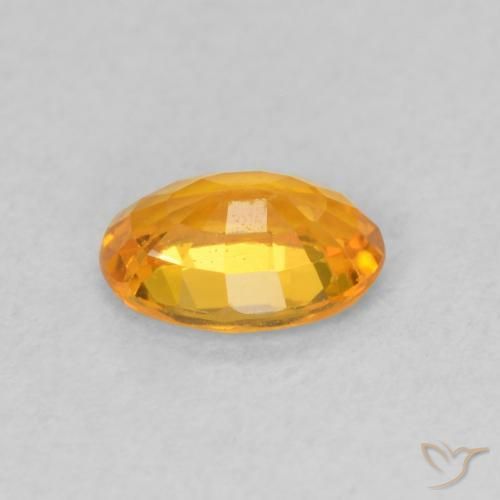 Zafiro Naranja albaricoque natural de 0.63 ct, Ovalada, VVS-VS