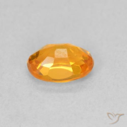 Zafiro Naranja medio natural de 0.62 ct, Ovalada, VVS-VS