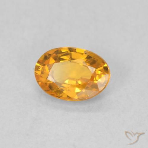 Zafiro Naranja albaricoque natural de 0.52 ct, Ovalada, VS