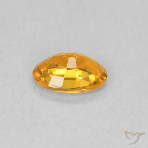 Zafiro Naranja albaricoque natural de 0.52 ct, Ovalada, VS