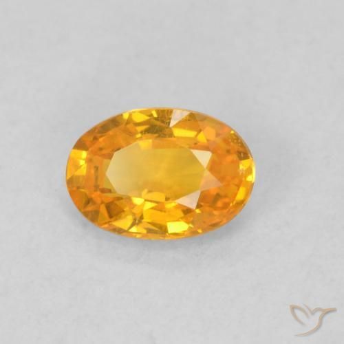 Zafiro Naranja albaricoque natural de 0.62 ct, Ovalada, VS