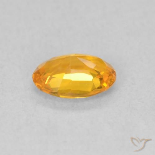 Zafiro Naranja albaricoque natural de 0.62 ct, Ovalada, VS