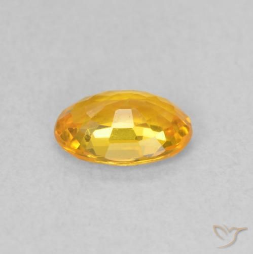 Zafiro Naranja claro natural de 0.59 ct, Ovalada, VS