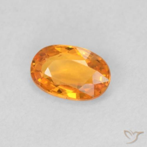 Zafiro Naranja medio natural de 0.58 ct, Ovalada, VVS-VS