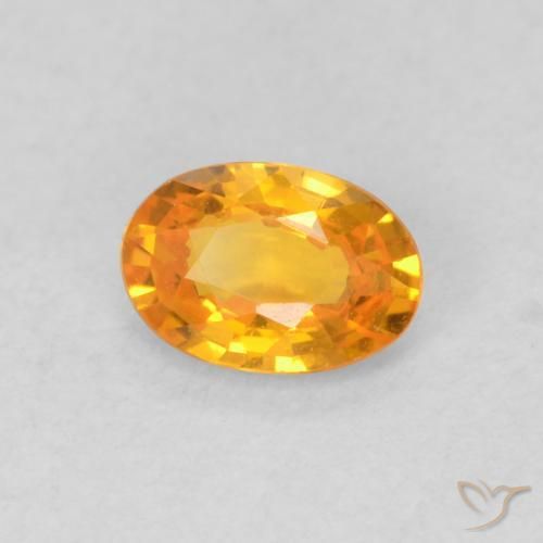 Zafiro Naranja claro natural de 0.61 ct, Ovalada, VVS-VS
