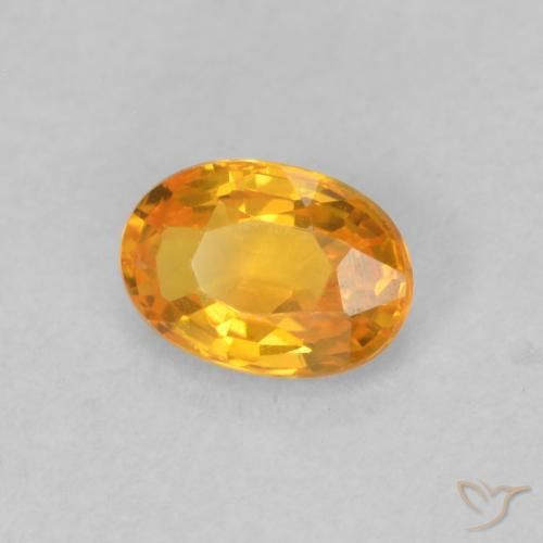 Zafiro Naranja claro natural de 0.63 ct, Ovalada, VVS-VS