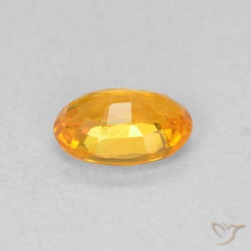 Zafiro Naranja claro natural de 0.63 ct, Ovalada, VVS-VS