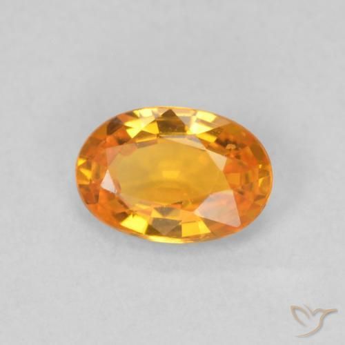 Zafiro Naranja claro natural de 0.61 ct, Ovalada, VVS-VS