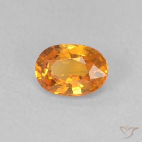 Zafiro Naranja claro natural de 0.57 ct, Ovalada, VVS-VS