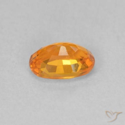 Zafiro Naranja claro natural de 0.57 ct, Ovalada, VVS-VS