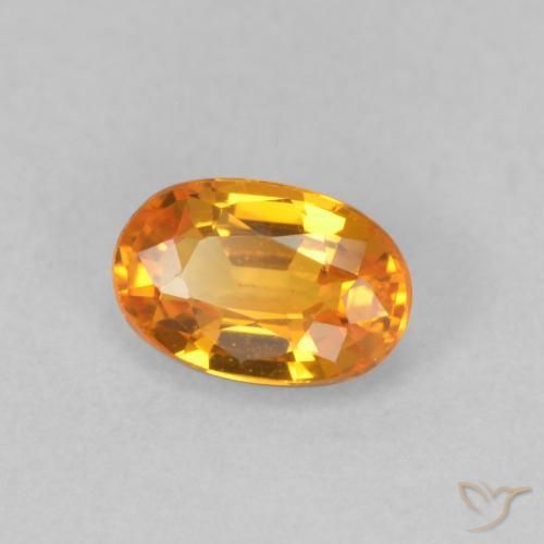 Zafiro Naranja medio natural de 0.64 ct, Ovalada, VVS