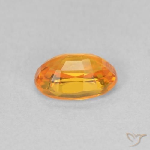 Zafiro Naranja medio natural de 0.64 ct, Ovalada, VVS