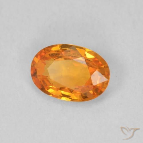 Zafiro Naranja medio natural de 0.58 ct, Ovalada, VVS