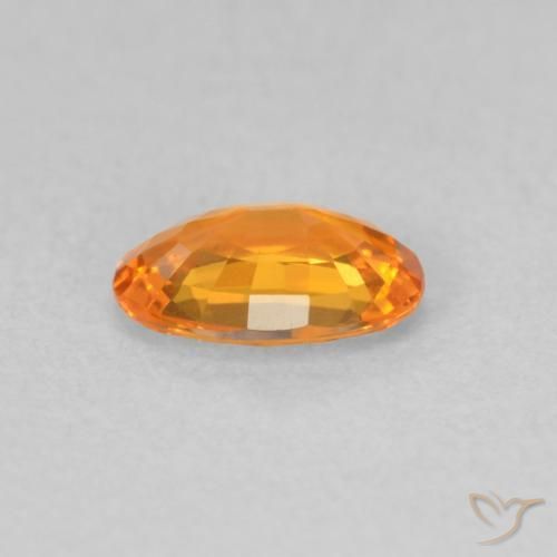 Zafiro Naranja medio natural de 0.58 ct, Ovalada, VVS