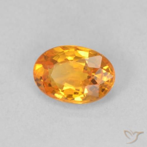 Zafiro Naranja claro natural de 0.66 ct, Ovalada, VVS