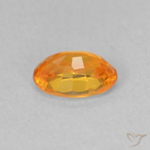 Zafiro Naranja claro natural de 0.66 ct, Ovalada, VVS