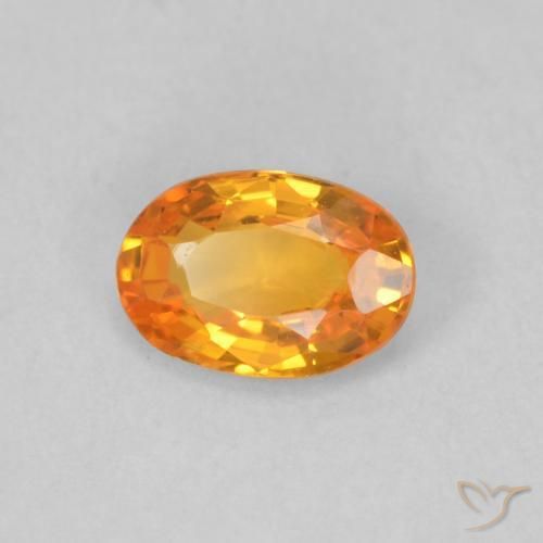 Zafiro Naranja claro natural de 0.53 ct, Ovalada, VVS