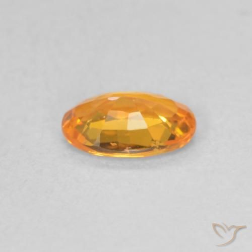 Zafiro Naranja albaricoque natural de 0.49 ct, Ovalada, VS