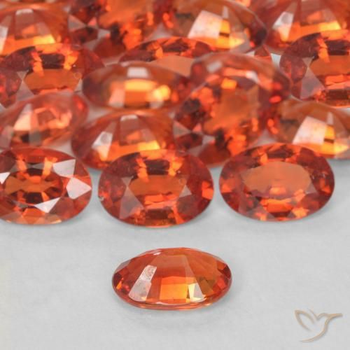 Zafiro Naranja fuego natural de 0.53 ct, Ovalada, VS
