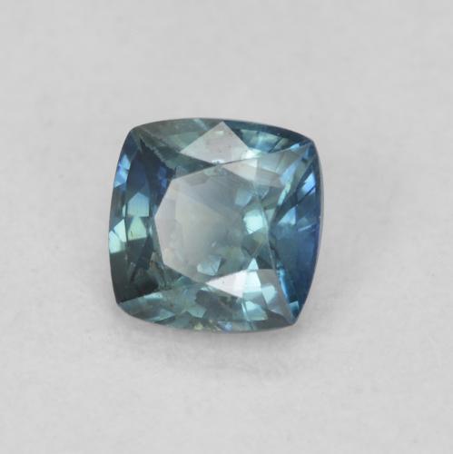 Zafiro Azul verdoso natural de 0.56 ct, Forma Cojín, VS