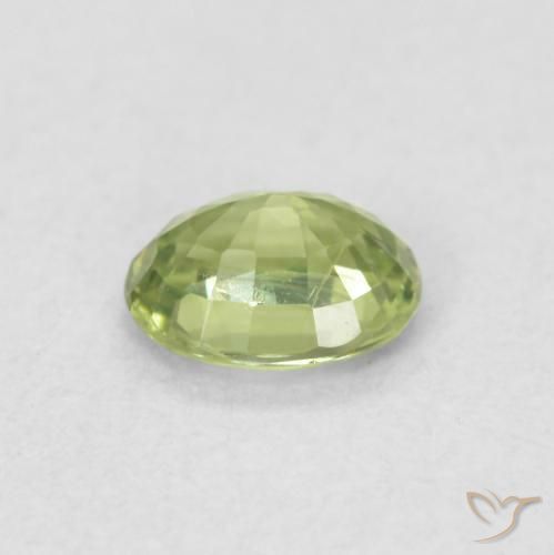 Zafiro Verde cálido natural de 0.46 ct, Ovalada, VVS-VS