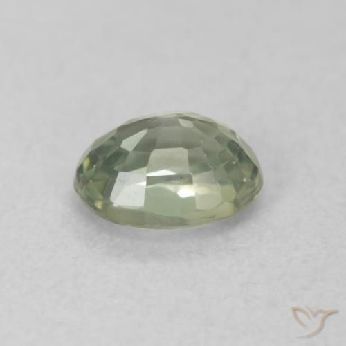 Zafiro Verde cálido natural de 0.55 ct, Ovalada, VVS-VS